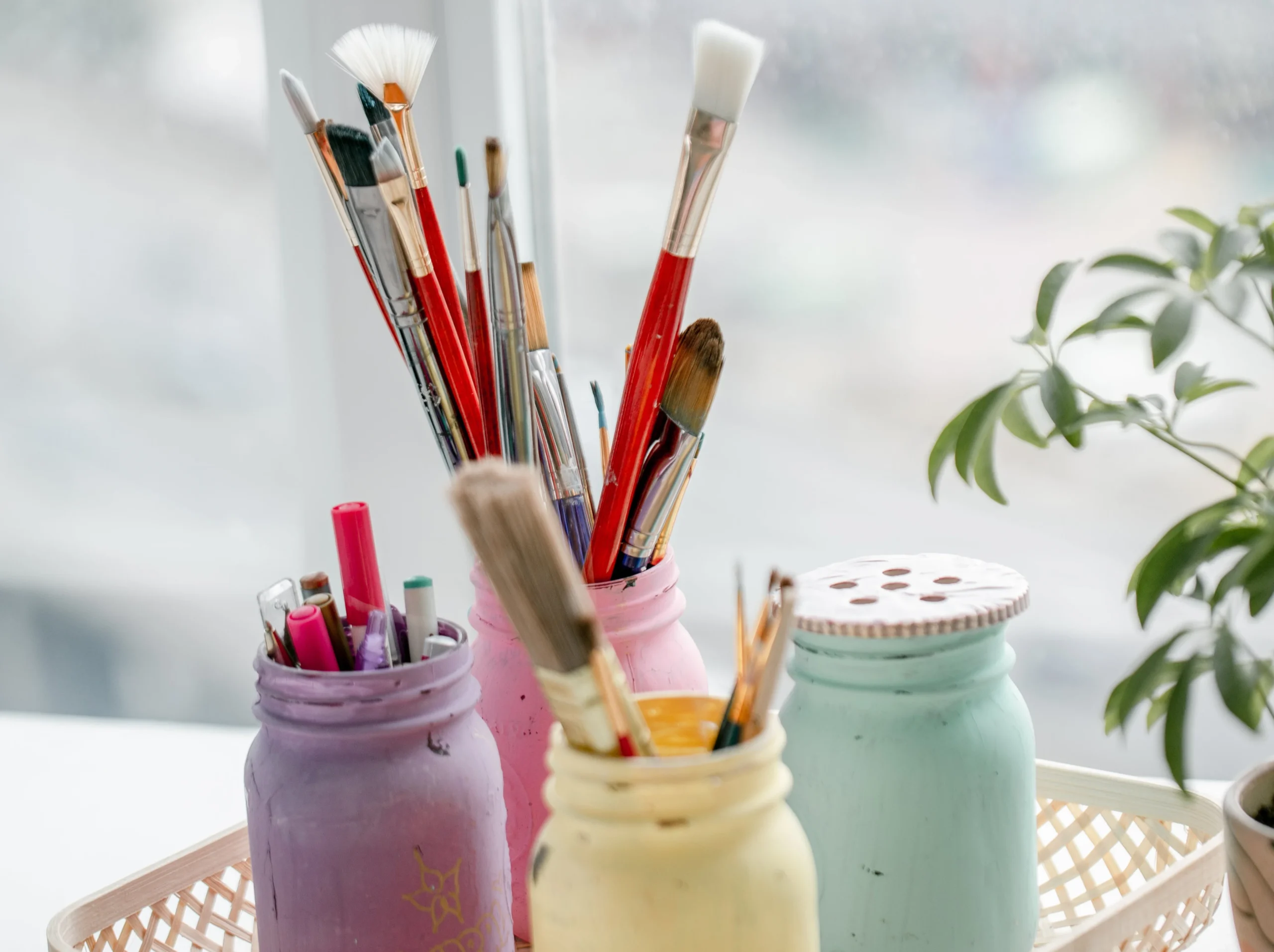 painted-mason-jars-with-a-variety-of-craft-supplies Framers and Art Supplies